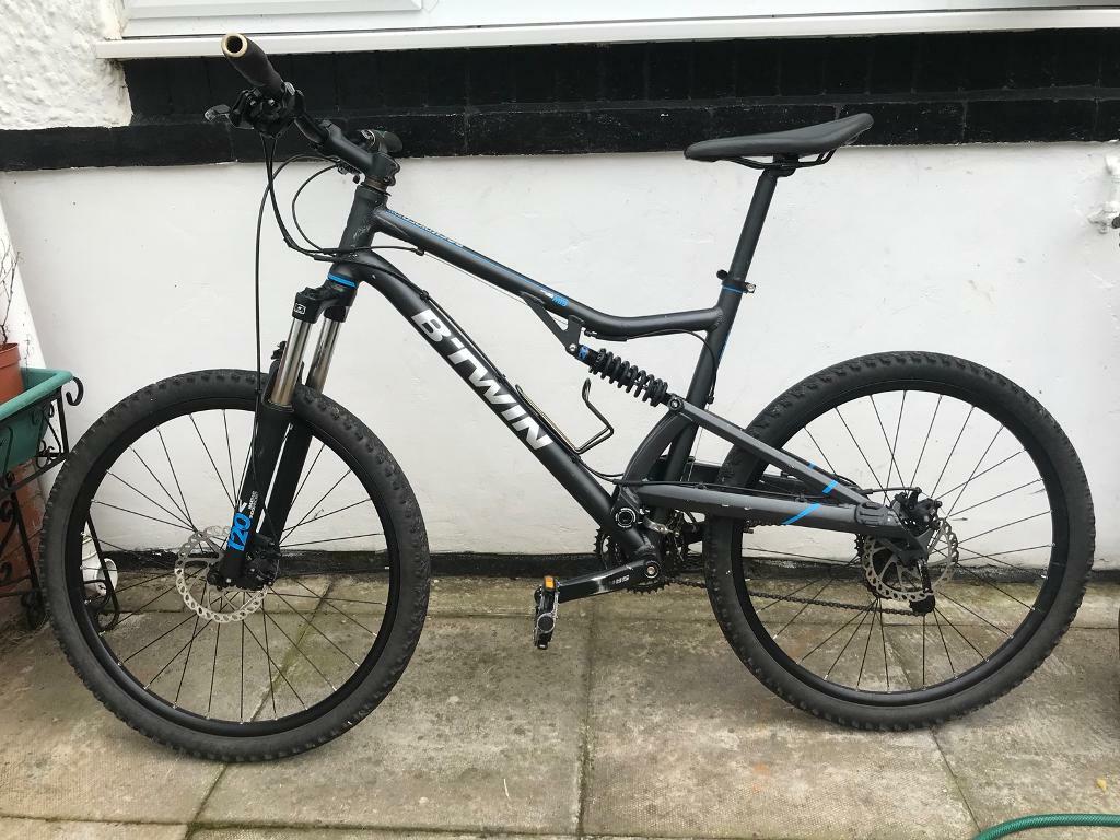 btwin mountain bike full suspension