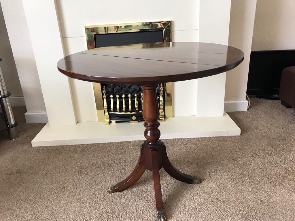 Round style mahogany pedestal coffee table by STRONGBOW