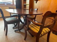 Classy reproduction mahogany dining table with 5 chairs