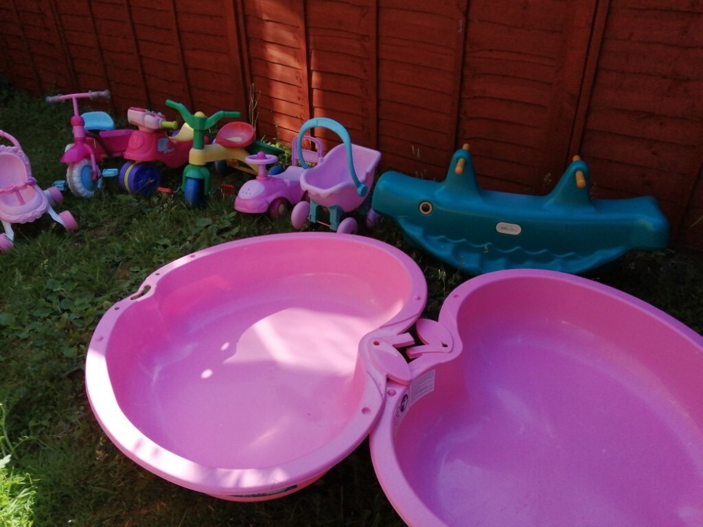 Various garden toys.. Ride ons Pink double shell sandpit/paddling