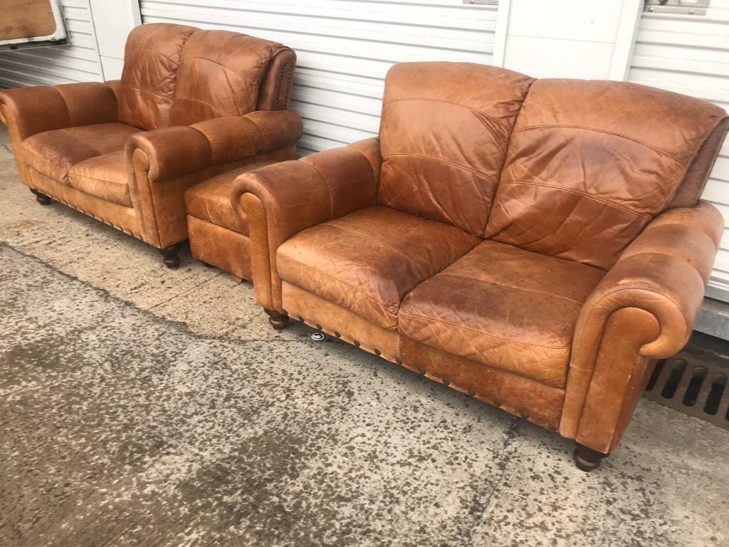 Dfs tan leather 2 seater sofas with footrest mint condition can deliver
