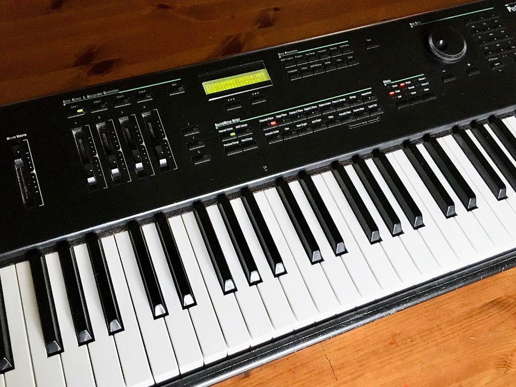 Kurzweil PC88 digital piano with weighted keys and sustain pedal in