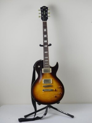 CORT CR280  SUN BURST ELECTRIC GUITAR  WITH STRAP  AND GIG BAG