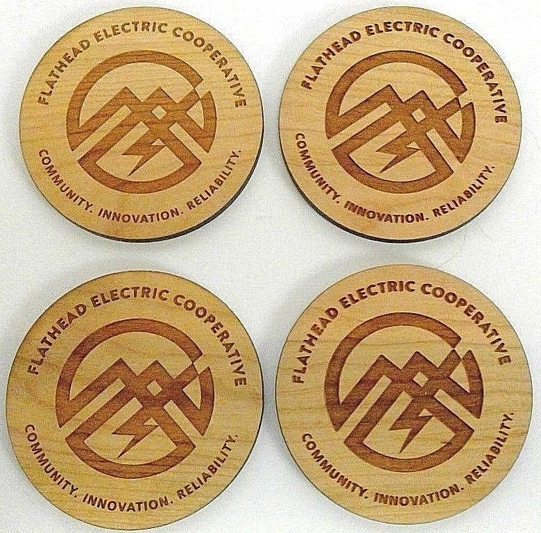 set 4 oak coasters Flathead Electric Coop logo 'Communication/Innovation...'