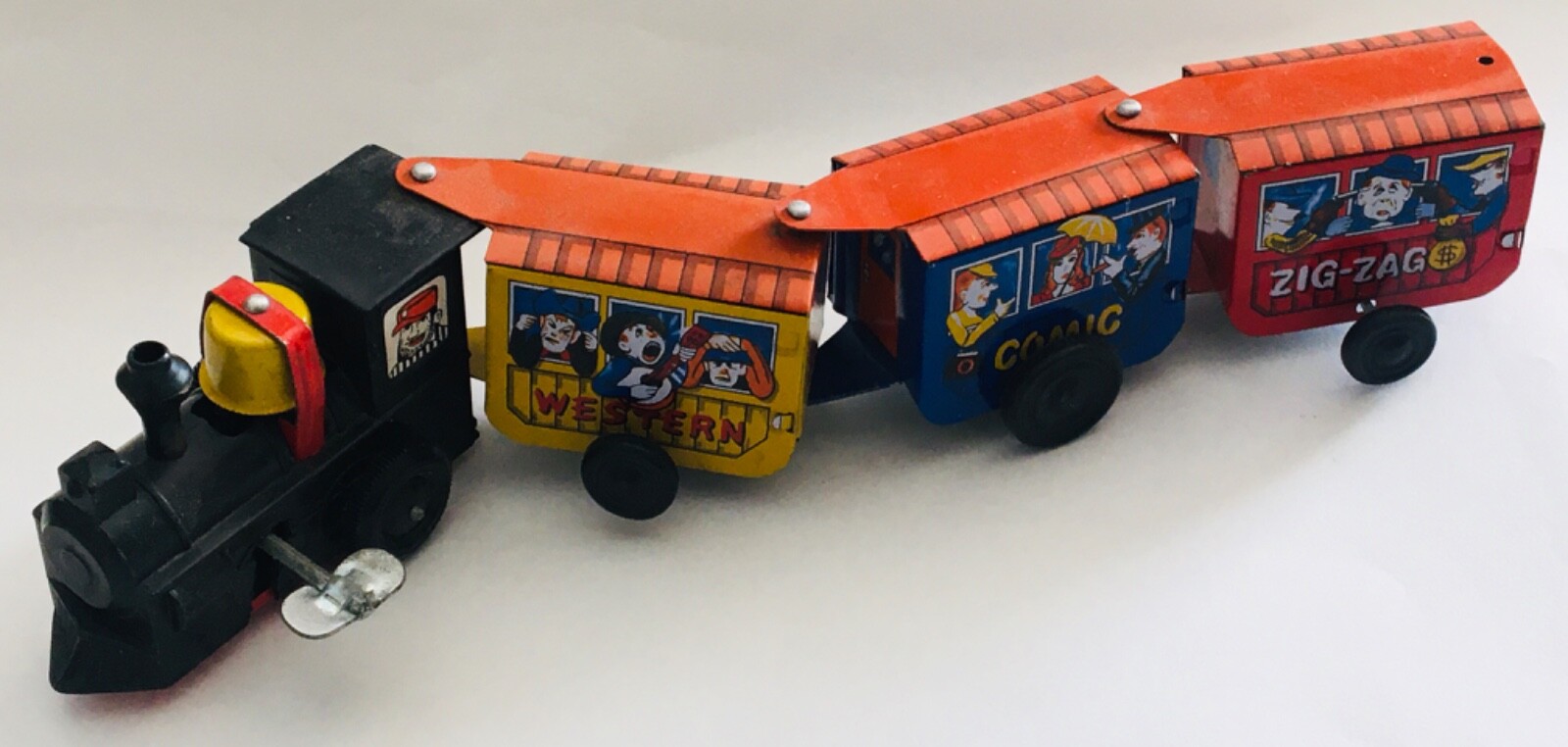 VINTAGE WIND UP WESTERN COMIC ZIG-ZAG EXPRESS TIN-LITHO TOY