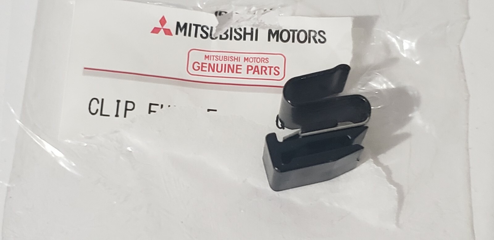 NEW OEM MITSUBISHI GALANT LANCER OUTLANDER SPORT FUEL DOOR RELEASE CLIP