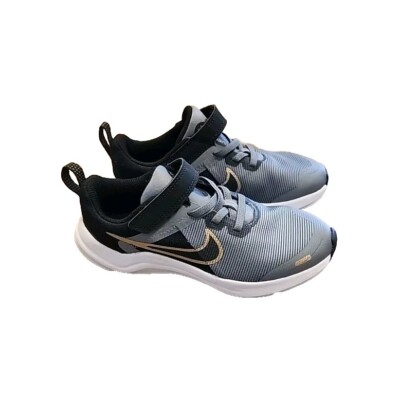 Kids Nike Black And Gold Size 13C