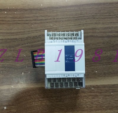 ONE USED XINJE XC-E4DA