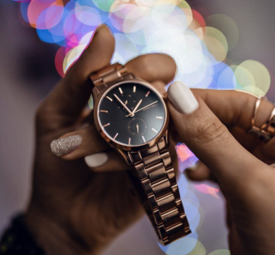 Aries store gold watch