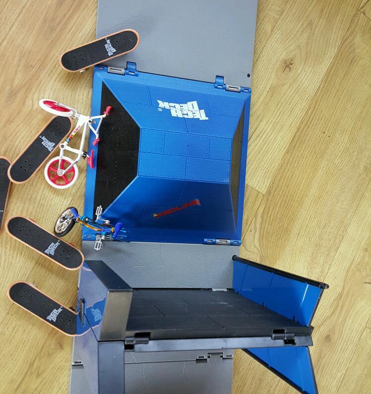 Tech deck skate park including stunt bikes and finger scooters in
