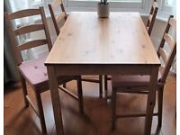 Ikea dining table Jokkmokk and four chairs