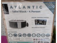 Wave spa black 4 person Atlantic hot tub