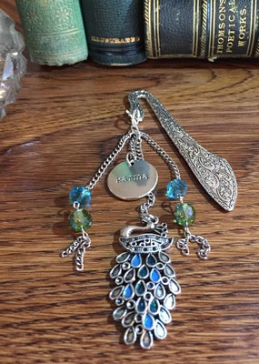 Karma is a Peacock on Ornate Silver Finish Bookmark with Blue & Green Swarovski