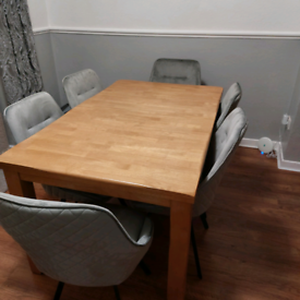Extending dining table. Chairs not included
