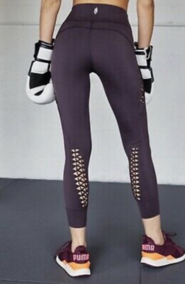 

Леггинсы Free People Movement Tranquility Фиолетовые 7/8 с вырезами и узлом  NWT, Purple gray