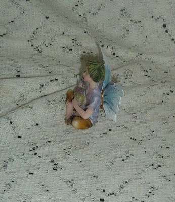 BLUE PURPLE PETITE MALE  FAIRY SITTING WITH ACORN 11937 2 1/2
