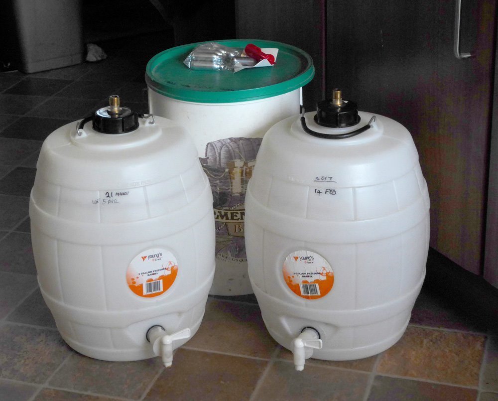 Home brew fermenting barrel and pressure barrels with valves in