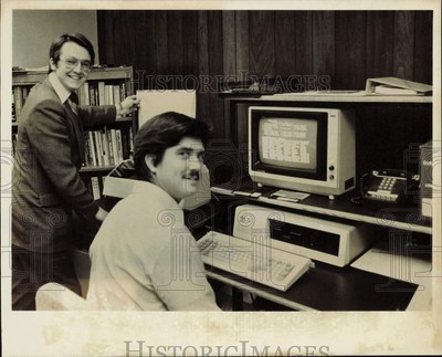 1983 Press Photo Men working with computers at office in Anchorage, Alaska