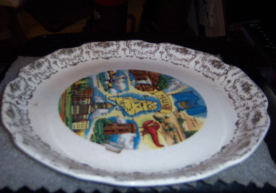 California collector plate edged with gold trim 7” round showing the San Francis