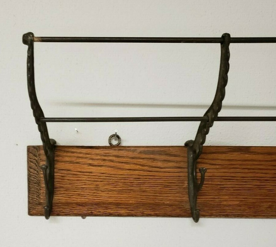 Antique Cast Iron Hooks on Oak Wood 31