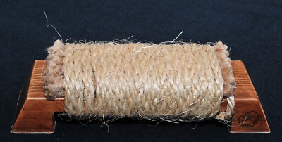 A portable makiwara for hardening the hitting surfaces of the hand. Handmade.