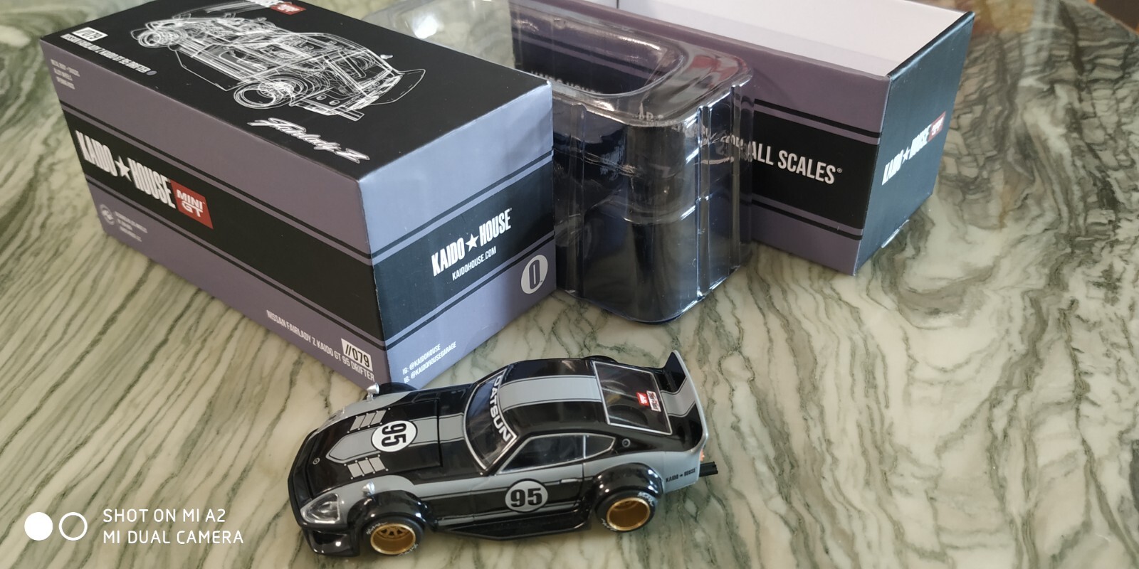 MINIGT x Kaido House 079 chase Nissan Fairlady Z kaido GT 95 MINIGT x Kaido House 079 chase Nissan Fairlady Z kaido GT 95
