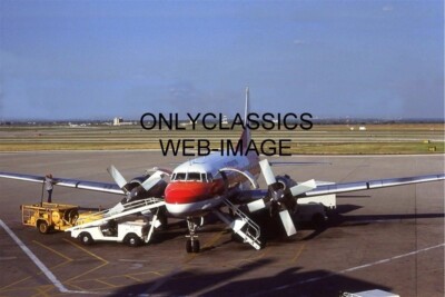 1979 FRONTIER AIRLINES CONVAIR 580 TURBO PROP GETTING FUEL BY AIRPORT CREW PHOTO