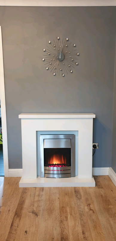 Adam Lomond Fireplace In Pure White With A Chrome Electric Fire In
