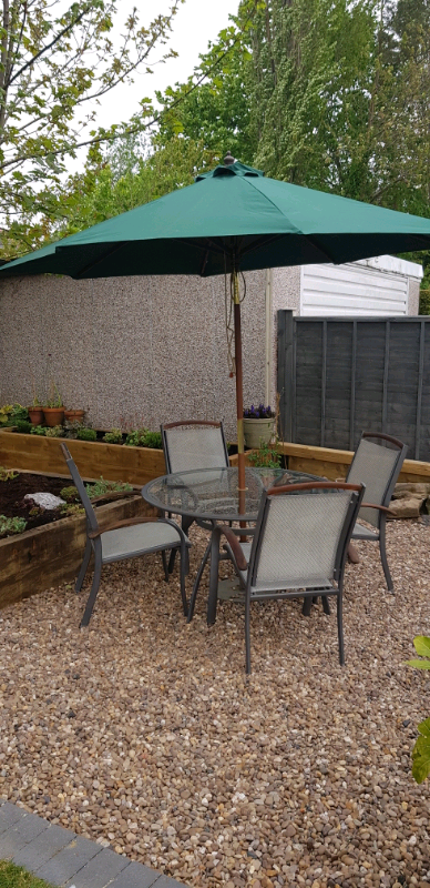 Outdoor table & chairs + parasol + base. | in Garforth, West Yorkshire