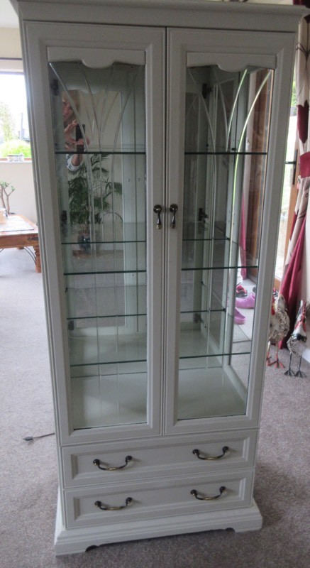 Mirrored Back Display Cabinet Two Glass Doors And Two Drawers