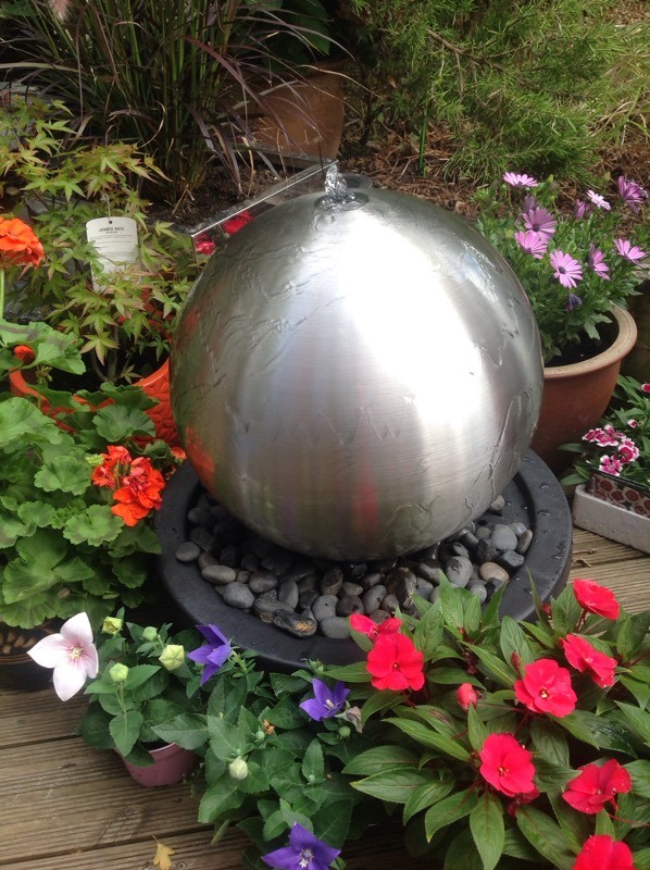 45cm brushed stainless steel sphere water feature in Earley