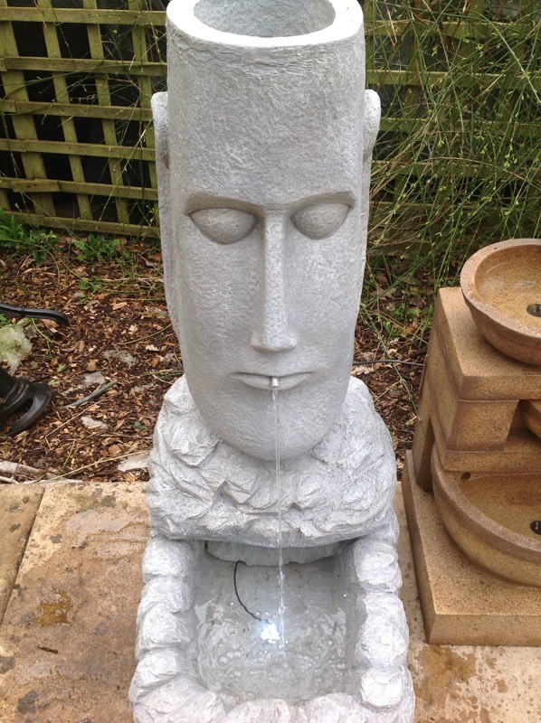 Large Easter Island Head water feature with LED lights in Earley