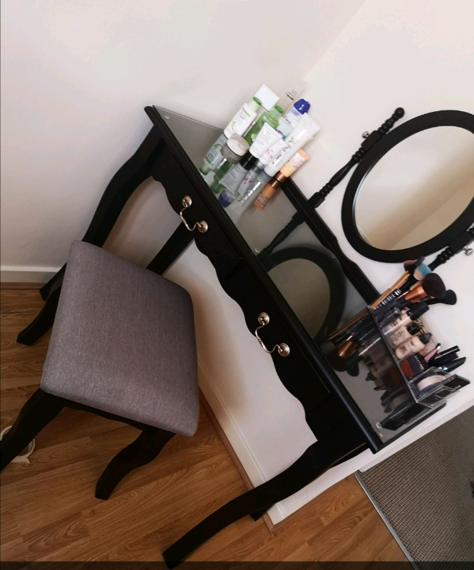 Black dressing table. Recently had a new glass top. in Carlton