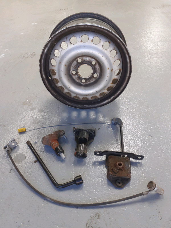 Ford transit connect spare wheel and carrier mechanism in