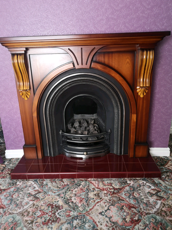 Cast iron gas fire wooden surround and hearth in Middlesbrough, North