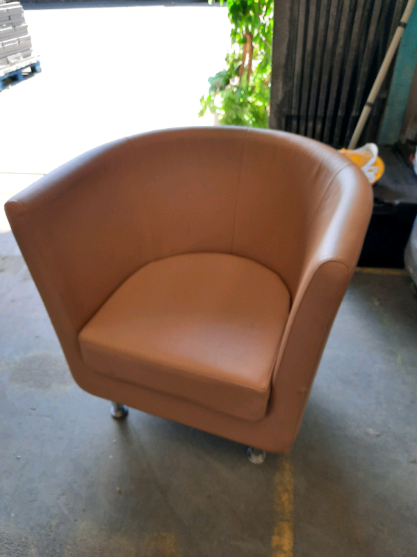FREE TO COLLECTOR Boss Tan faux leather tub chair with small tear | in