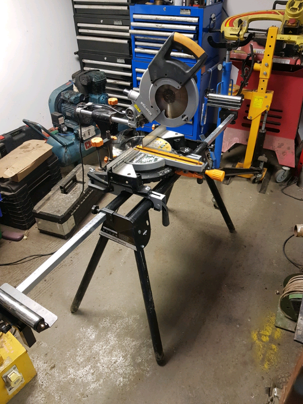 evolution 2000w 230v 255mm sliding compound mitre saw and stand in