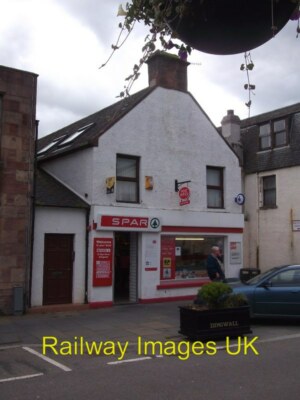Photo 6x4 Dingwall post office At the back of a convenience store. The po c2015
