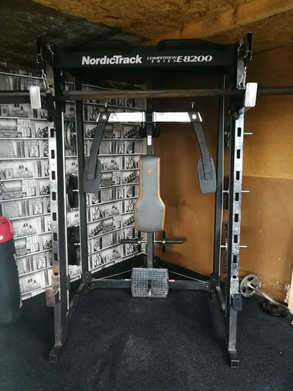 nordic track smith machine for sale with olympic weight plates in