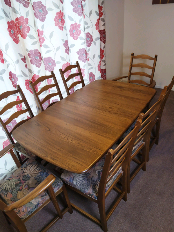 Ercol vintage extendable dining table and 8 chairs in Calverton