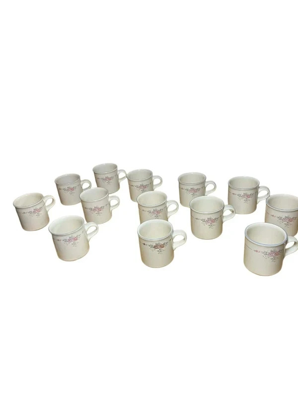 Comes with all 13 mugs No chips or cracks they're in great condition overall T