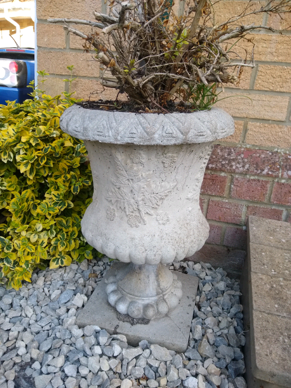 Large decorative stone garden planter pot on stand / plinth in Poole