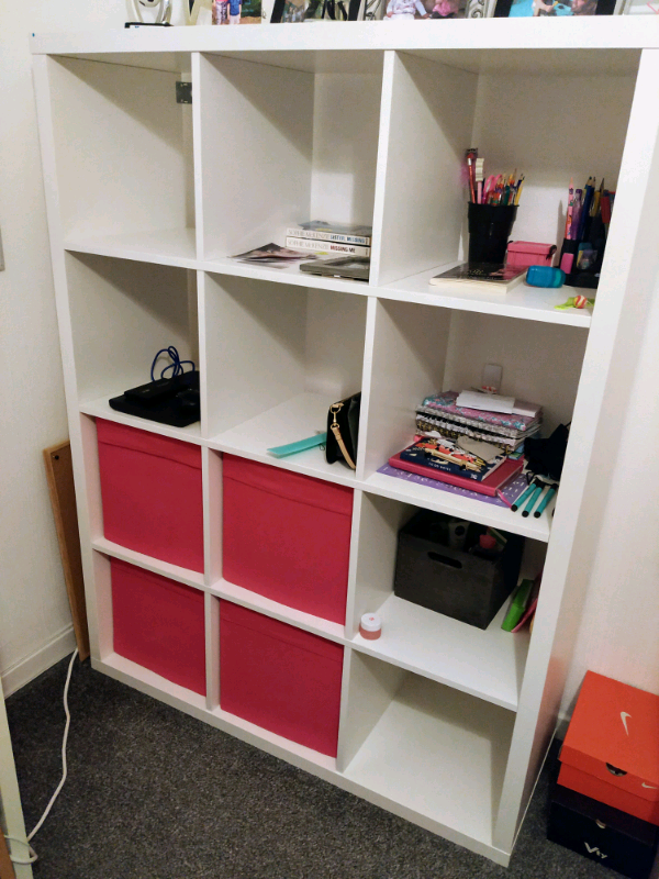 IKEA Kallax 12 cube white shelving unit with 4 storage cubes in