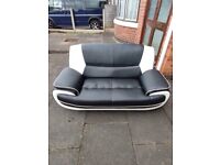2 seater synthetic leather sofa wear & tear to sofa as seen in picture