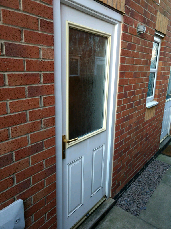 White UPVC double glazed external door + frame + handles + lock + key