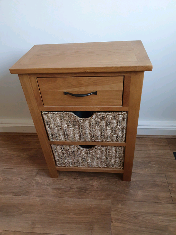 Dunelm Sidmouth oak table with large storage baskets exc. condition
