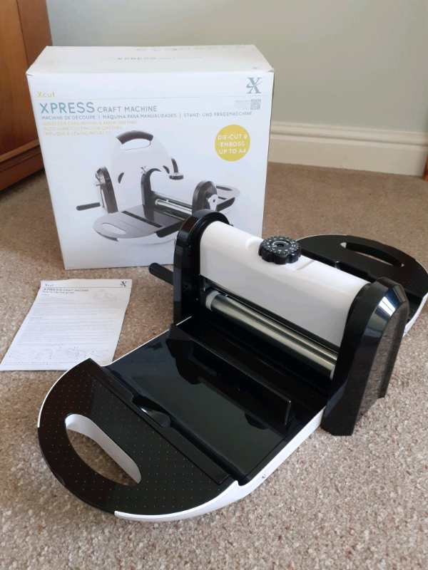 Xcut Xpress Die Cutter Craft Machine with 6 sets of dies in