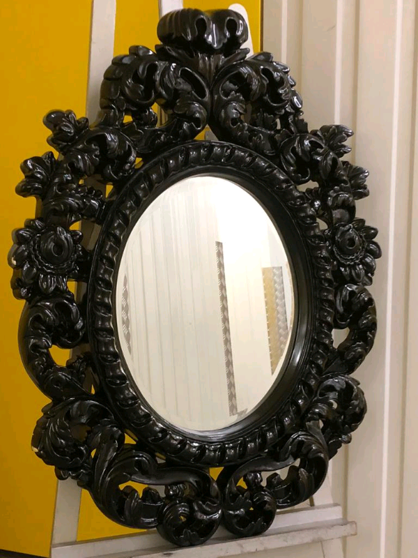 LARGE HIGHLY ORNATE BLACK FRAMED MIRROR. in Scarborough, North