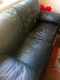 2x two seater leather couches 