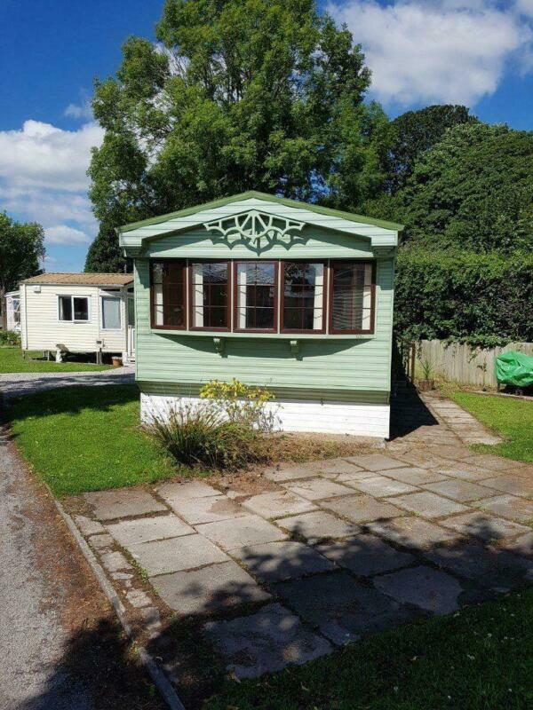 Static caravan for sale on canal side location sited near Southport
